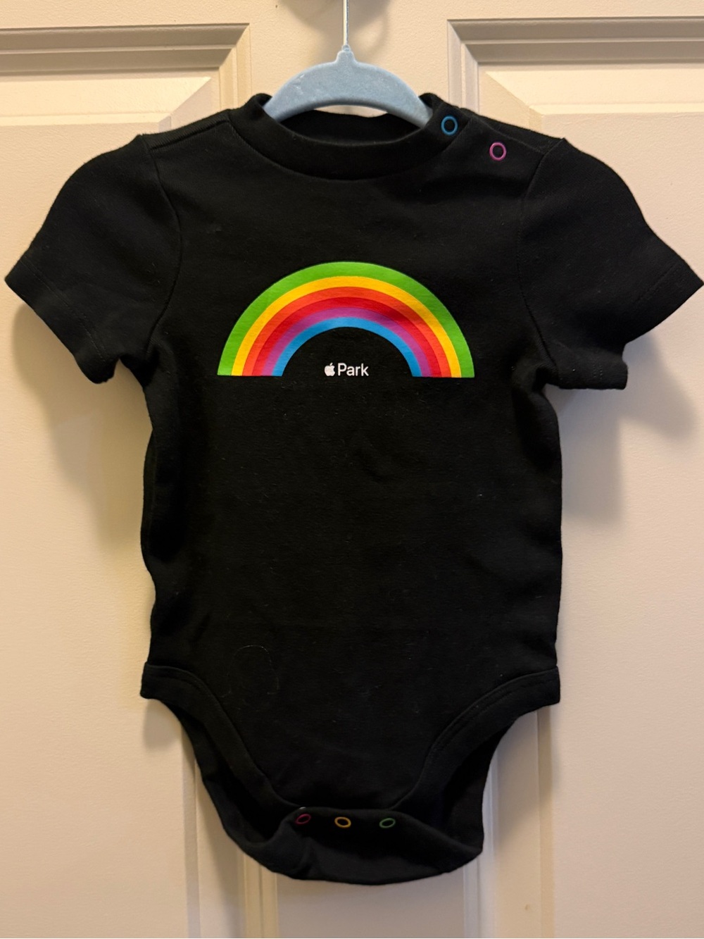 Apple Black Baby Onesie with Rainbow Graphic